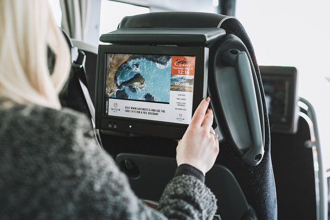 Airport Transfer in Iceland from Keflavik Airport to Reykjavik City With Hotel Drop Off - Finding the Orange Buses and Getting Seated Fast