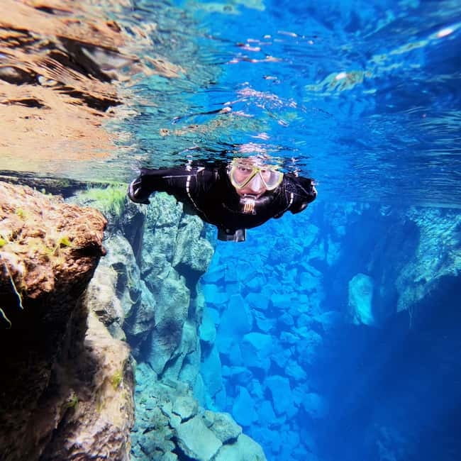 From Reykjavik: Silfra Snorkeling with Free Photos - Drysuit vs wetsuit: picking the comfort level that matches you