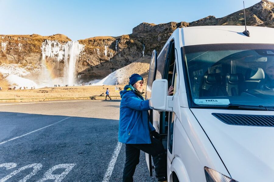 From Reykjavik: South Coast & Glacier Hike - Reynisfjara black sand beach, basalt columns, and Reynisdrangar warning signs