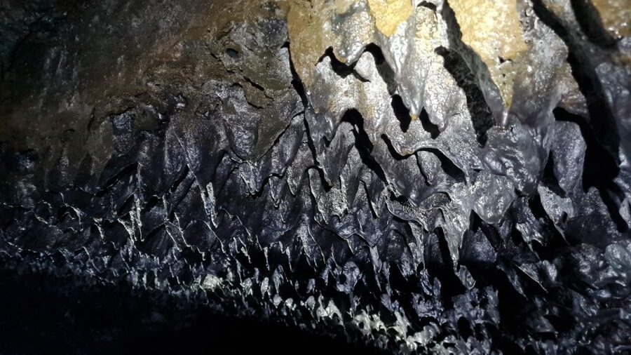 Geological Lava Tunnel Adventure - Arnarker Cave - Winter ice and year-round cave conditions