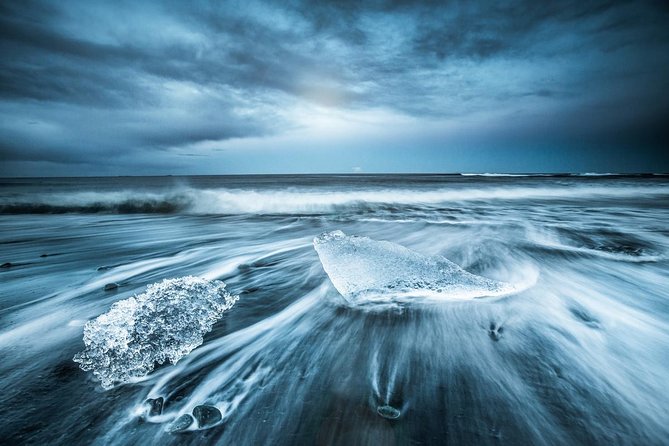 Reykjavik: Glacier Lagoon, Diamond Beach & South Coast Day Tour - Vík: black-sand town energy with sea stacks