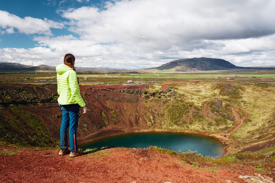Reykjavik: Golden Circle Day Trip with Blue Lagoon Transfer - Kerid volcanic crater: aquamarine water against red rock