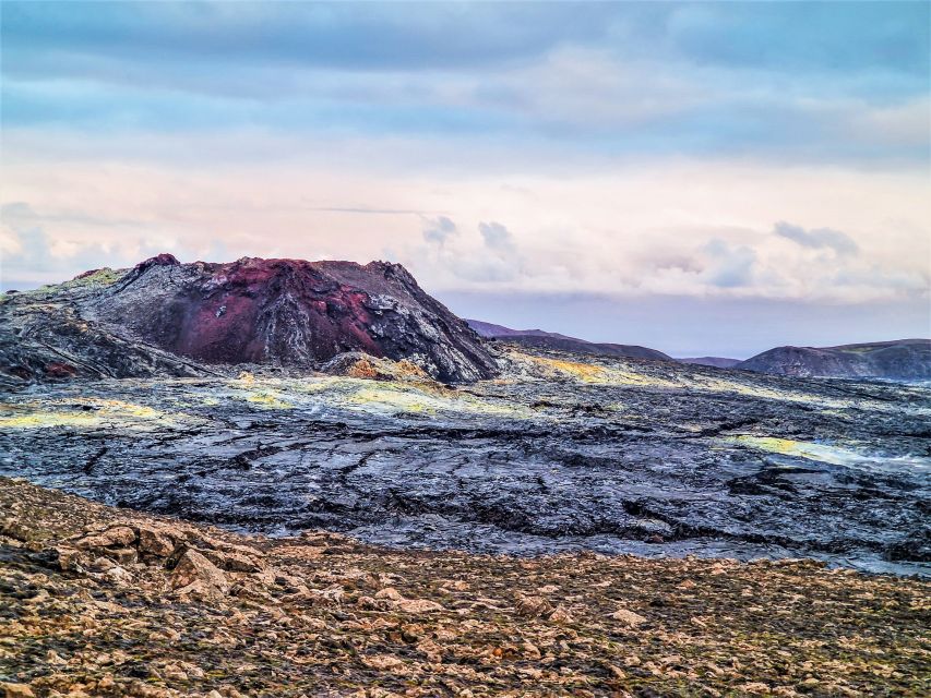 Reykjavík: Guided Afternoon Hiking Tour to New Volcano Site - Geldingadalur hike: timing, effort, and how to handle the wind