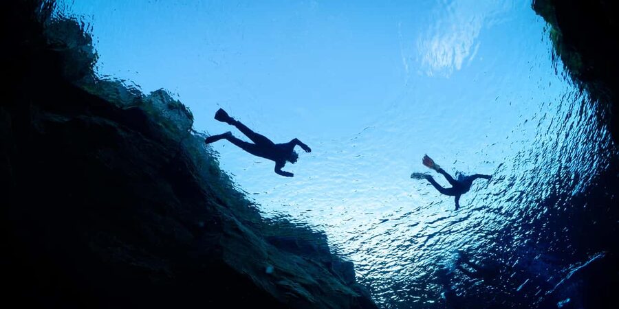 Reykjavík: Silfra Fissure Snorkeling and Lava Caving Tour - From lava darkness to Silfra blue, one day that actually makes sense