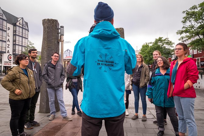Reykjavik Walking Tour - Walk with a Viking - Meeting at Ingólfur Square: the 3-meter pillars and your Viking guide