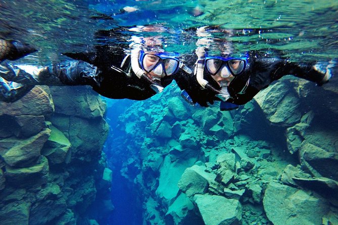 Silfra Drysuit Snorkeling Tour with Free Photos - From Reykjavik - Photos and hot chocolate: the included extras that make it feel complete