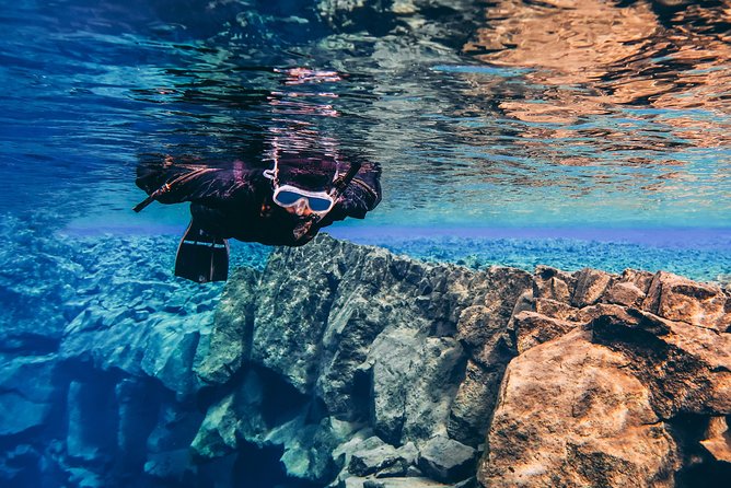 Silfra: Hot and Cold Snorkeling and Spa Tour - Self Drive - In-water experience: clear geology, calm guidance, and real visibility