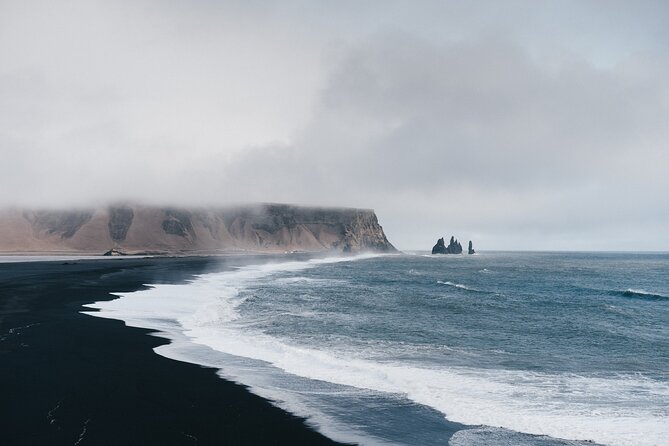 South Coast, Waterfalls and Black Sand Beach (Small Group Tour) - Skogafoss Waterfall: 60m Falls, the Hidden Chest Story, and 45 Minutes